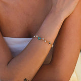 APM Monaco Dainty Pearl & Blue Stone Bracelet in yellow silver