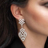 APM Monaco Single Arabesque Dropping Earring in white silver