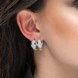 APM Monaco small serpent hoop earrings with navy blue stones in white silver