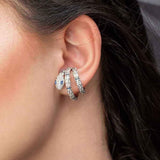 APM Monaco single serpent ear cuff with navy blue stones in white silver