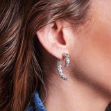 APM Monaco mono lucky eye underlobe earring in white silver