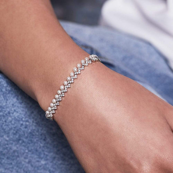 APM Monaco Up and down adjustable bracelet with pearls in white silver