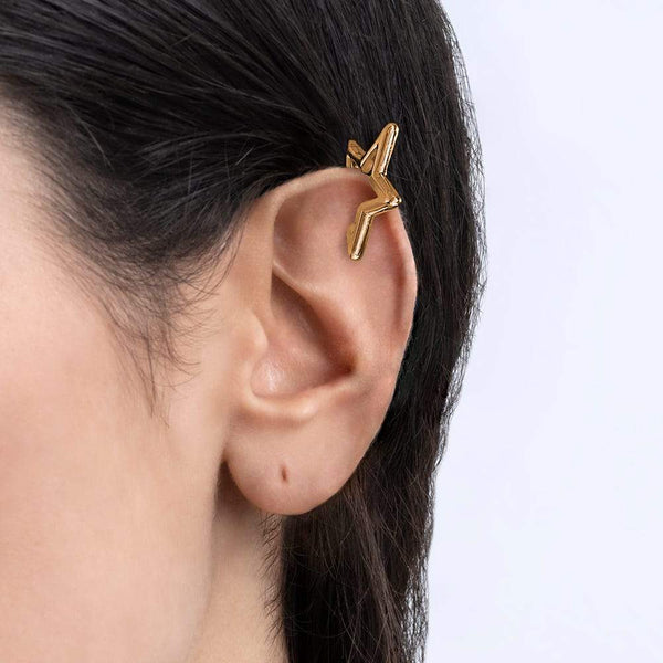 APM Monaco Single Star Sliding Ear Cuff in yellow silver