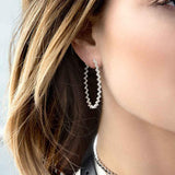 APM Monaco Oval up and down earrings in white silver